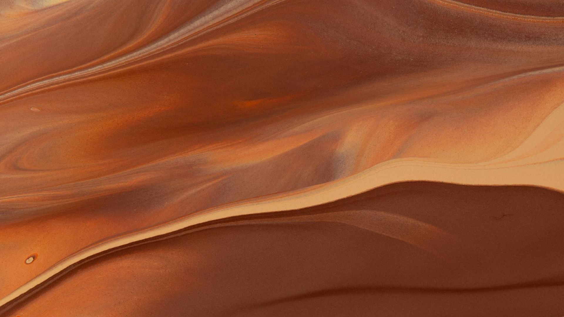 Calm abstract background with fluid lines suggesting movement.